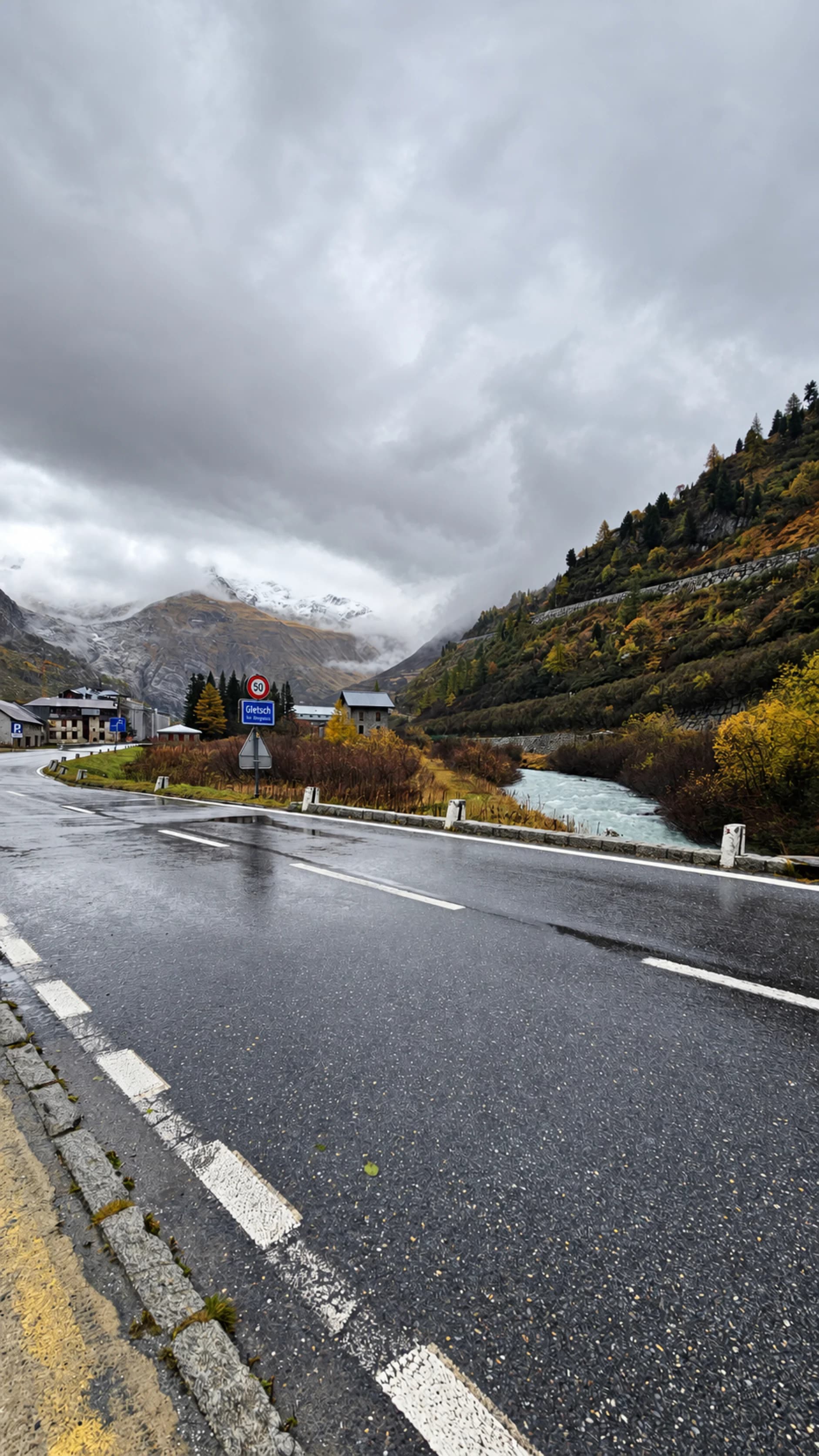 Autumn mountains and the winding road through Gletsch, Switzerland
